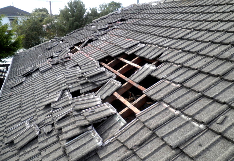 Storm damaged roof roof inspections